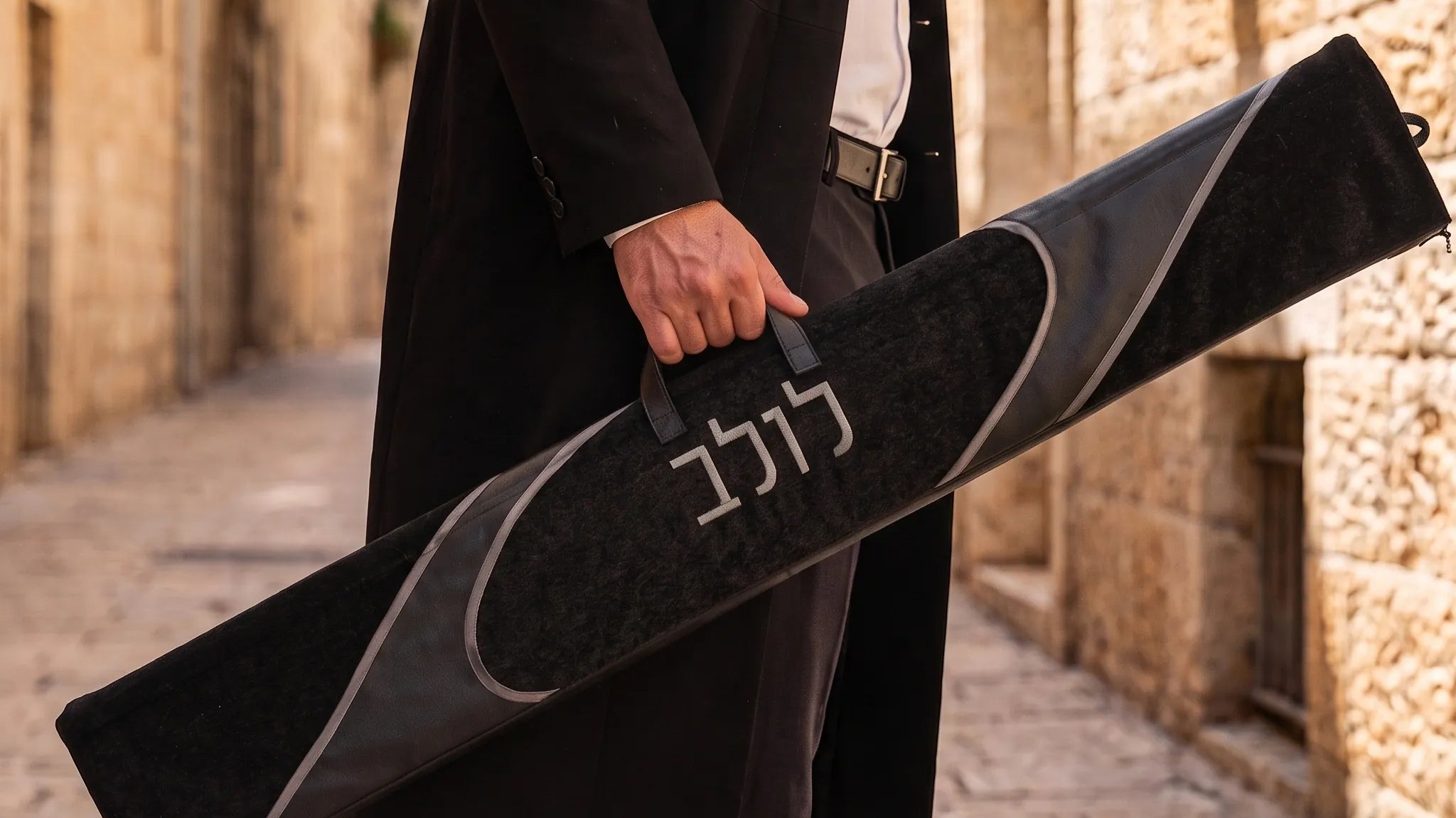 Man carrying leather lulav case in Jerusalem on Sukkot