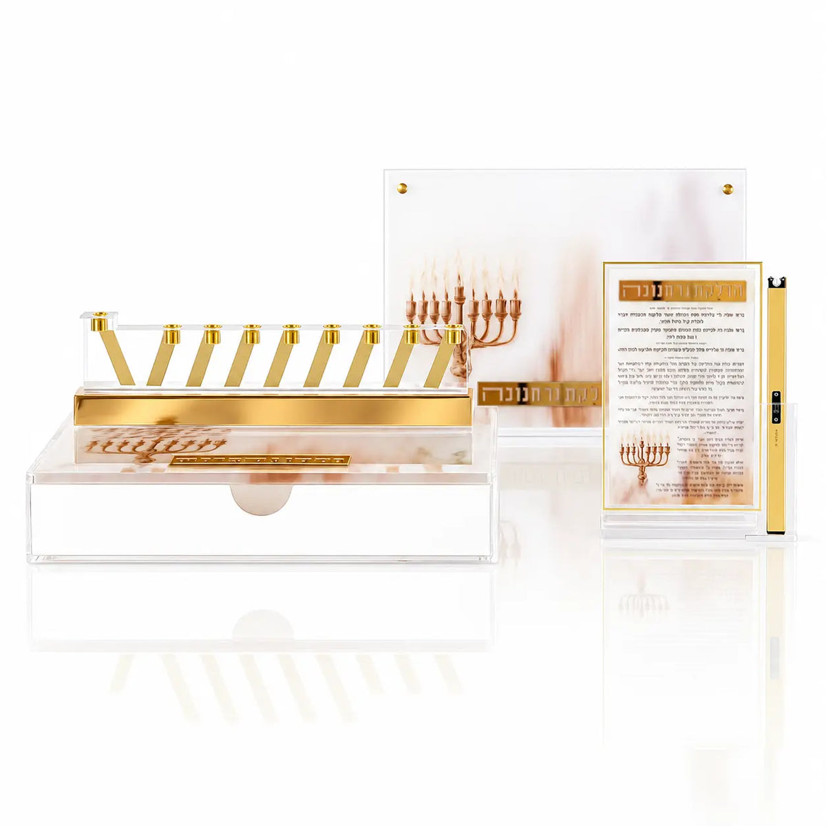 A Waterdale Collection Chanukah display - a painted Lucite menorah tray, a gold menorah, a printed brachos tabletop and a lighter, set for candle lighting