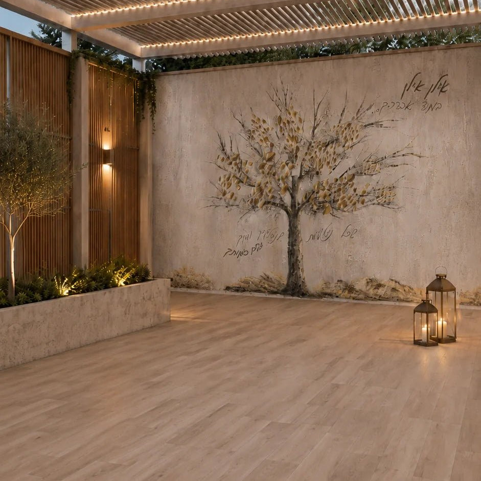 Painted by Judy Family Tree vinyl sukkah mural on a sukkah wall in a modern pergola with wood floors and a candle lantern
