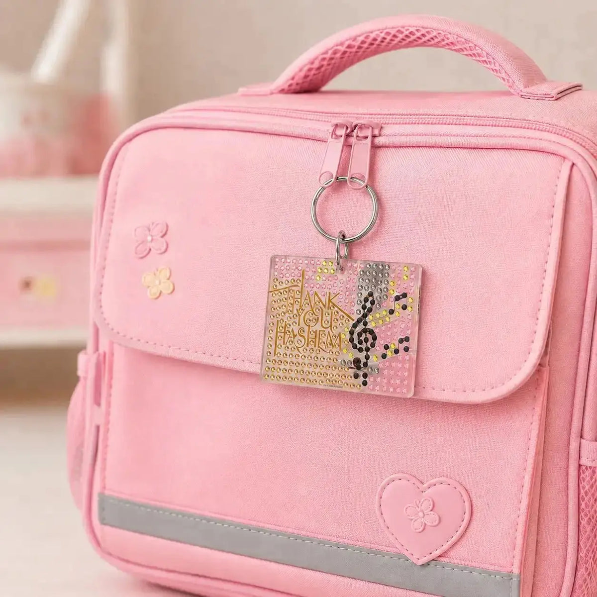 Diamond Art Thank You Hashem keychain with colorful beaded design attached to pink school bag with luggage tag holder