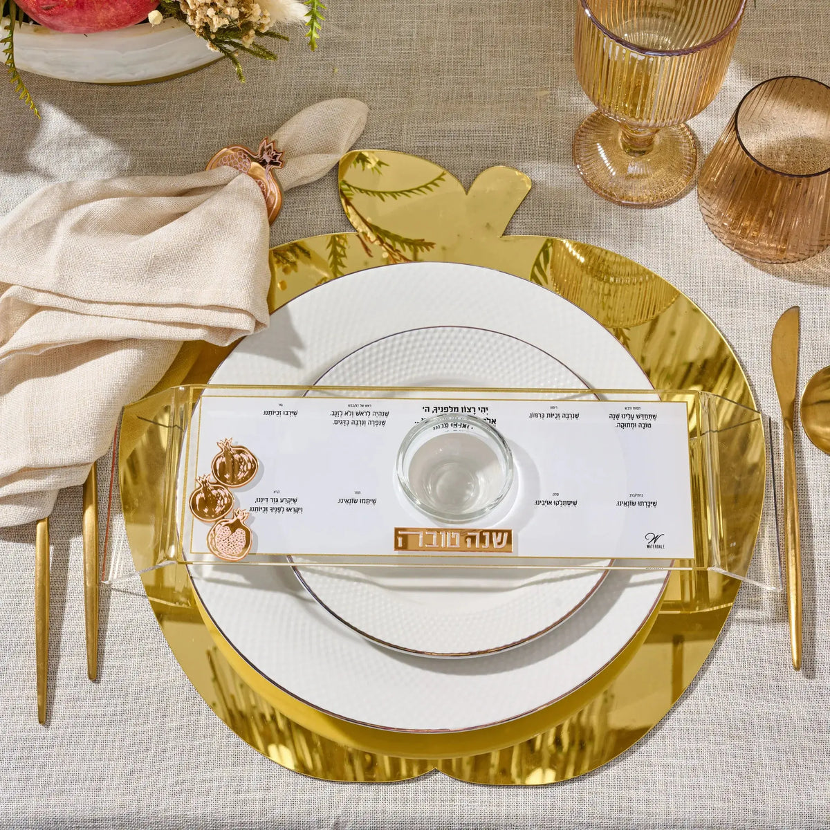 Gold mirror apple-shaped Lucite charger for the Jewish New Year (ראש השנה)