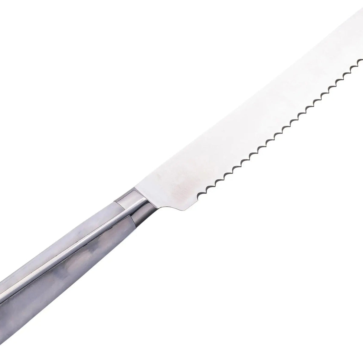 Waterdale Collection bread knife with white handle and serrated blade for slicing bread and baked goods.