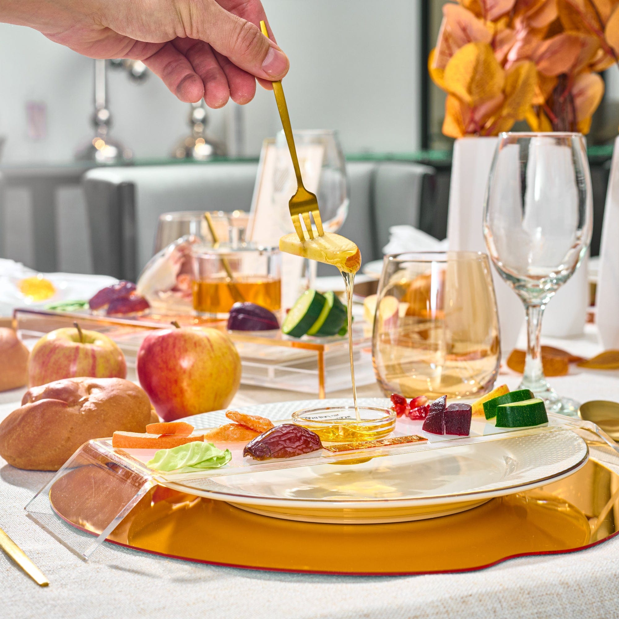 Classic 2.0 Raised Simanim Trays (4) with honey dish and other items on top of it