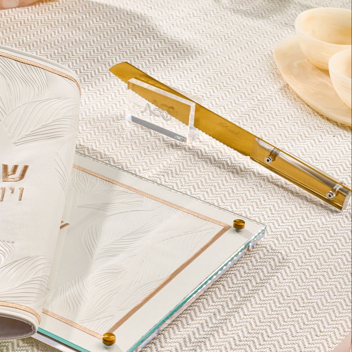 Luxury "Classic Series" bread knife by Waterdale Collection, featuring a high-carbon stainless steel serrated blade and a sleek minimalist handle for the Shabbat Challah table.