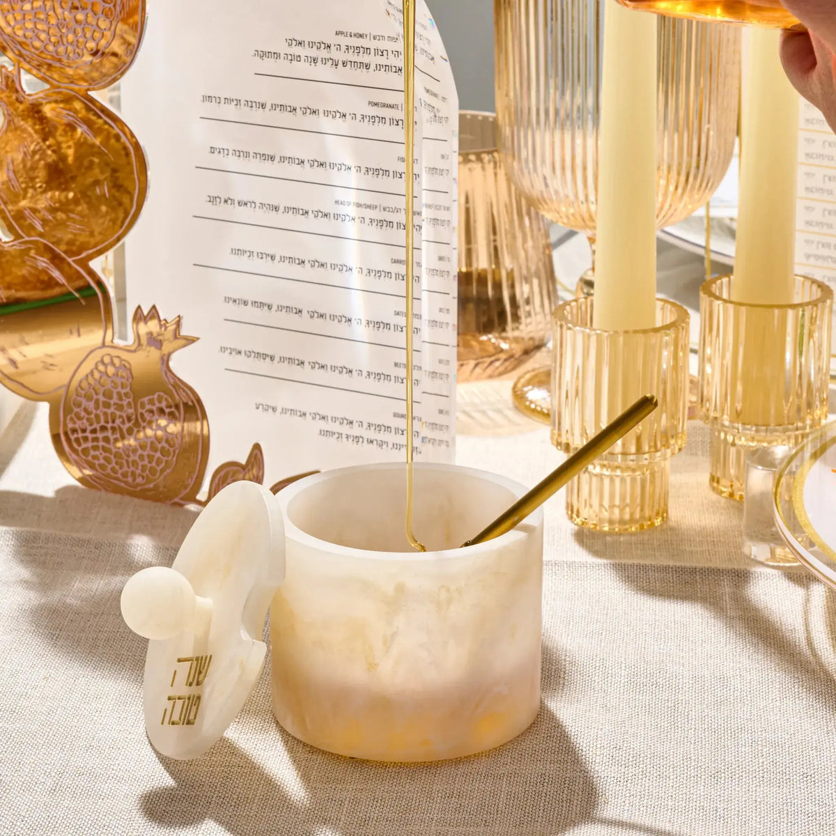 Round resin honey dish lettered Shana Tova for the Jewish New Year