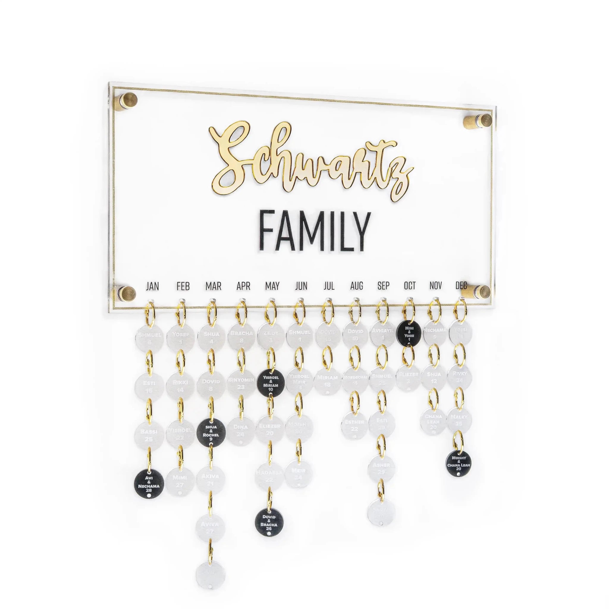 Custom calendar with family birthdays and anniversaries hanging. Crafted from clear lucite in clear with clear and black circles hanging from the main board. Your family name printed in the middle.