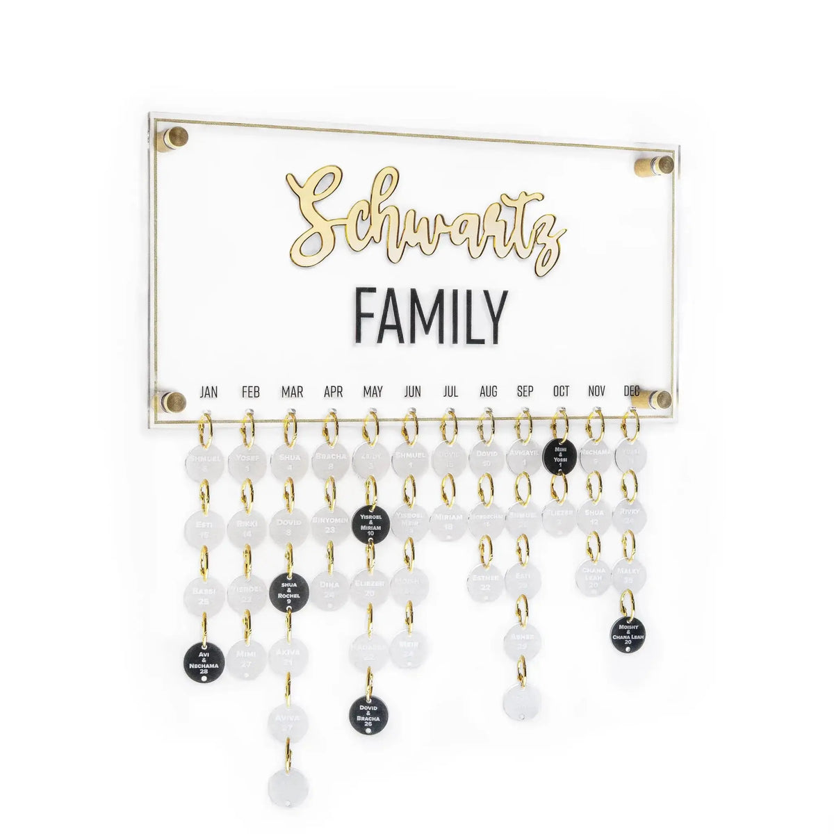 Waterdale Collection custom family occasion calendar with gold lettering, cream pegs, and hanging black and white marble-style charms for birthday tracking.