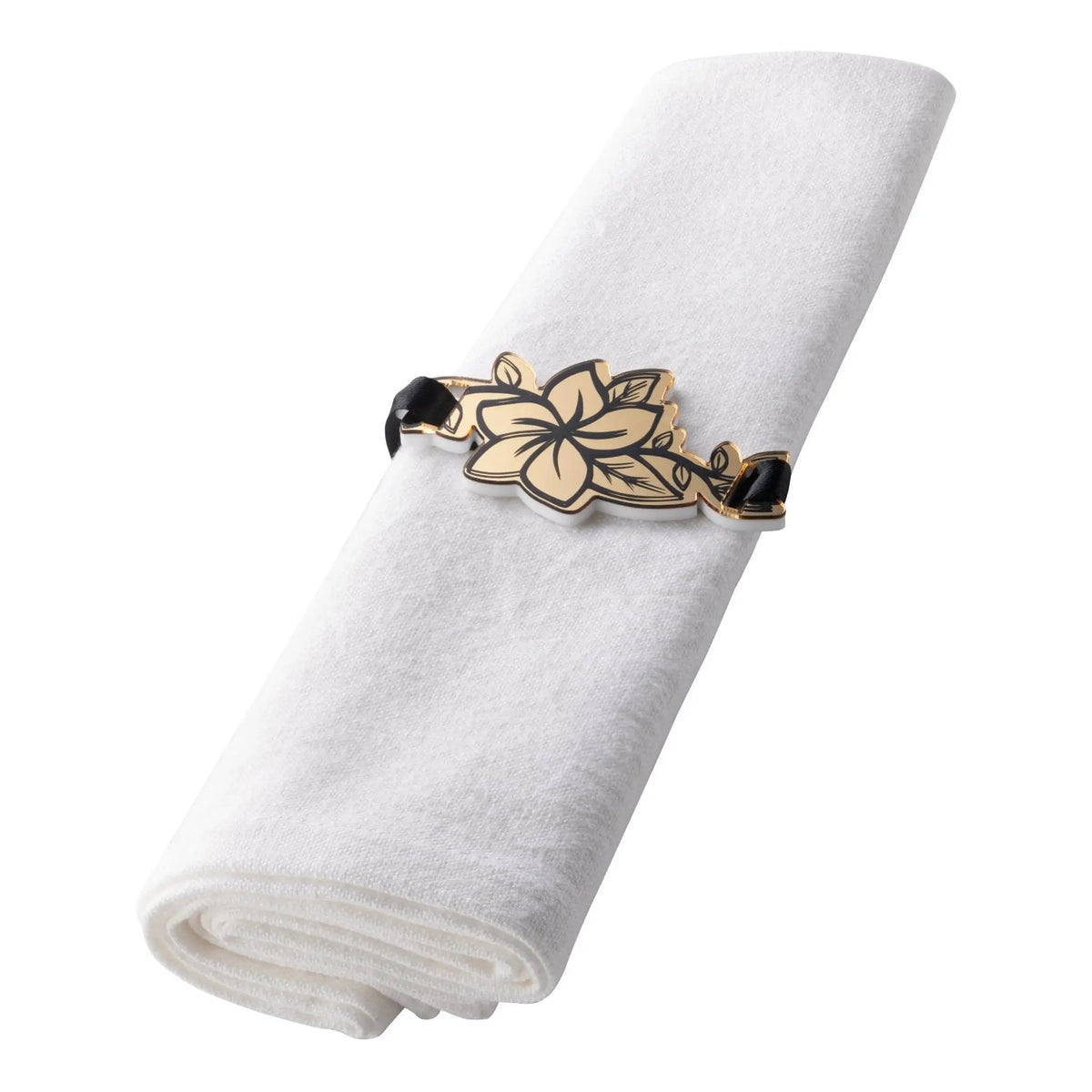 Gold floral napkin ring with black accents holding a white linen napkin, featuring detailed leaf design for table settings.