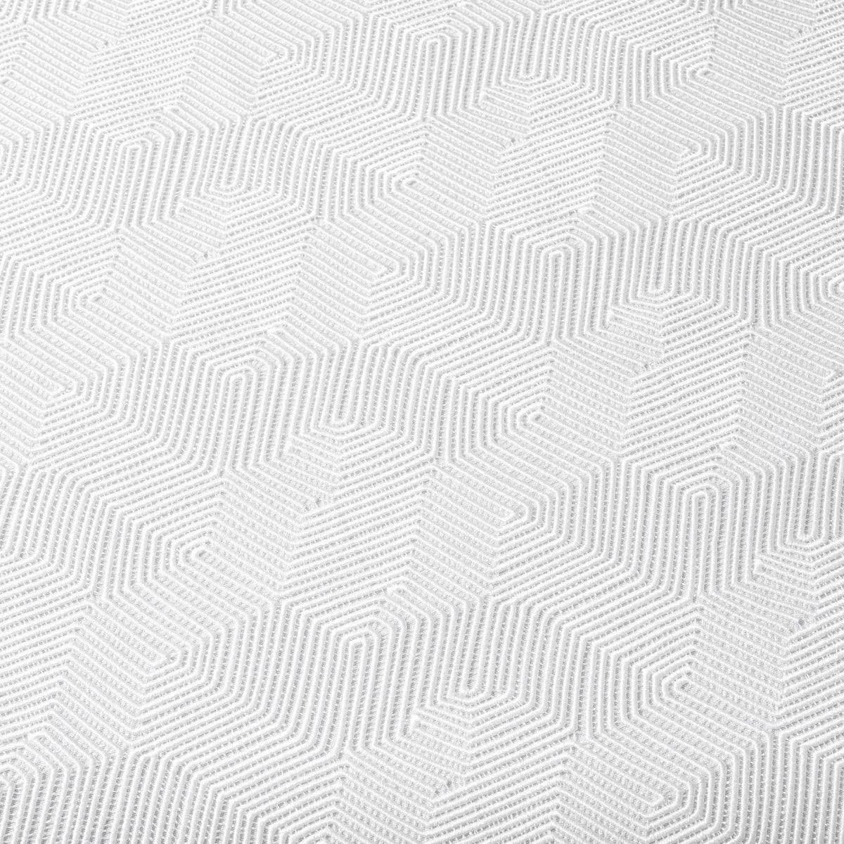 White geometric tablecloth with raised diamond pattern texture, perfect for Shabbat and Pesach dining from Waterdale Collection.