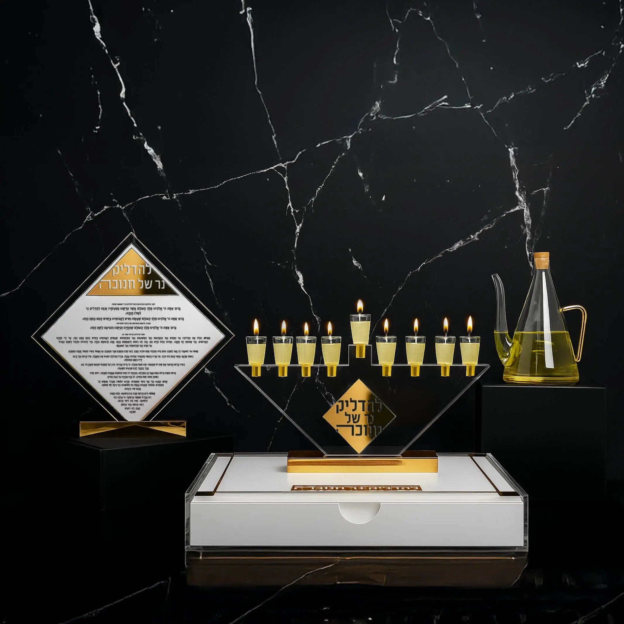 Diamond Chanukah Collection featuring Diamond Menorah with gold accents, Classic 2.0 Menorah Tray with built-in drawer, Diamond Chanukah Brachos Tabletop, Diamond Chanukah Match Jar, and elegant Glass Oil Jug, coordinated modern Judaica set for elevated Chanukah candle lighting and luxury holiday décor.