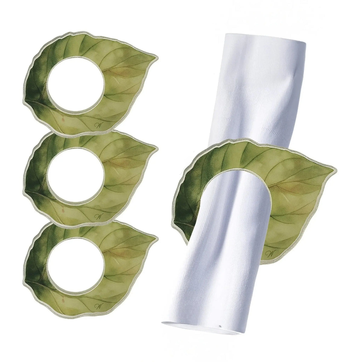 Four green leaf Lucite napkin rings displayed with rolled white napkins, showing reusable table decor for dining and entertaining.