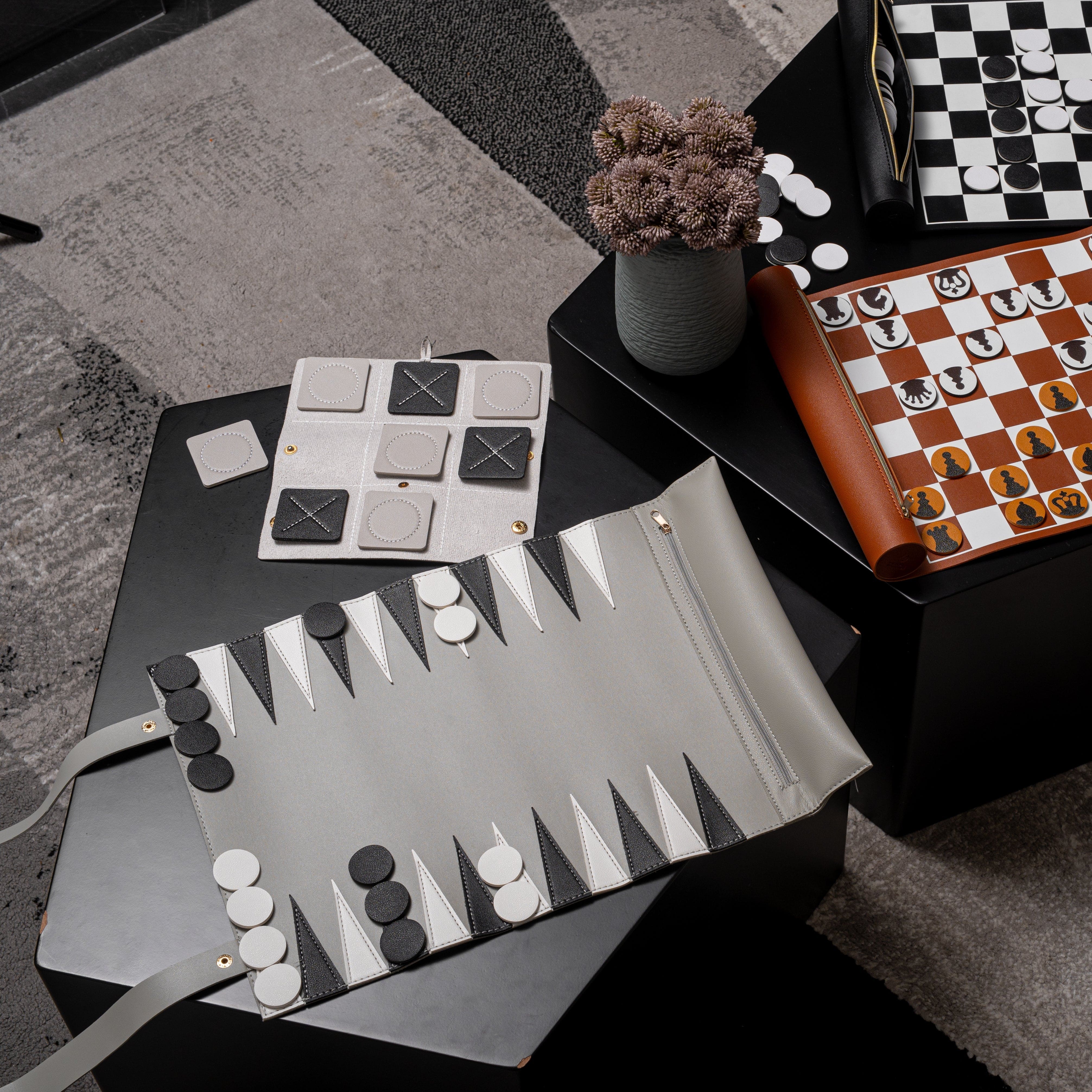 Leather Backgammon Game displayed on modern nesting tables.