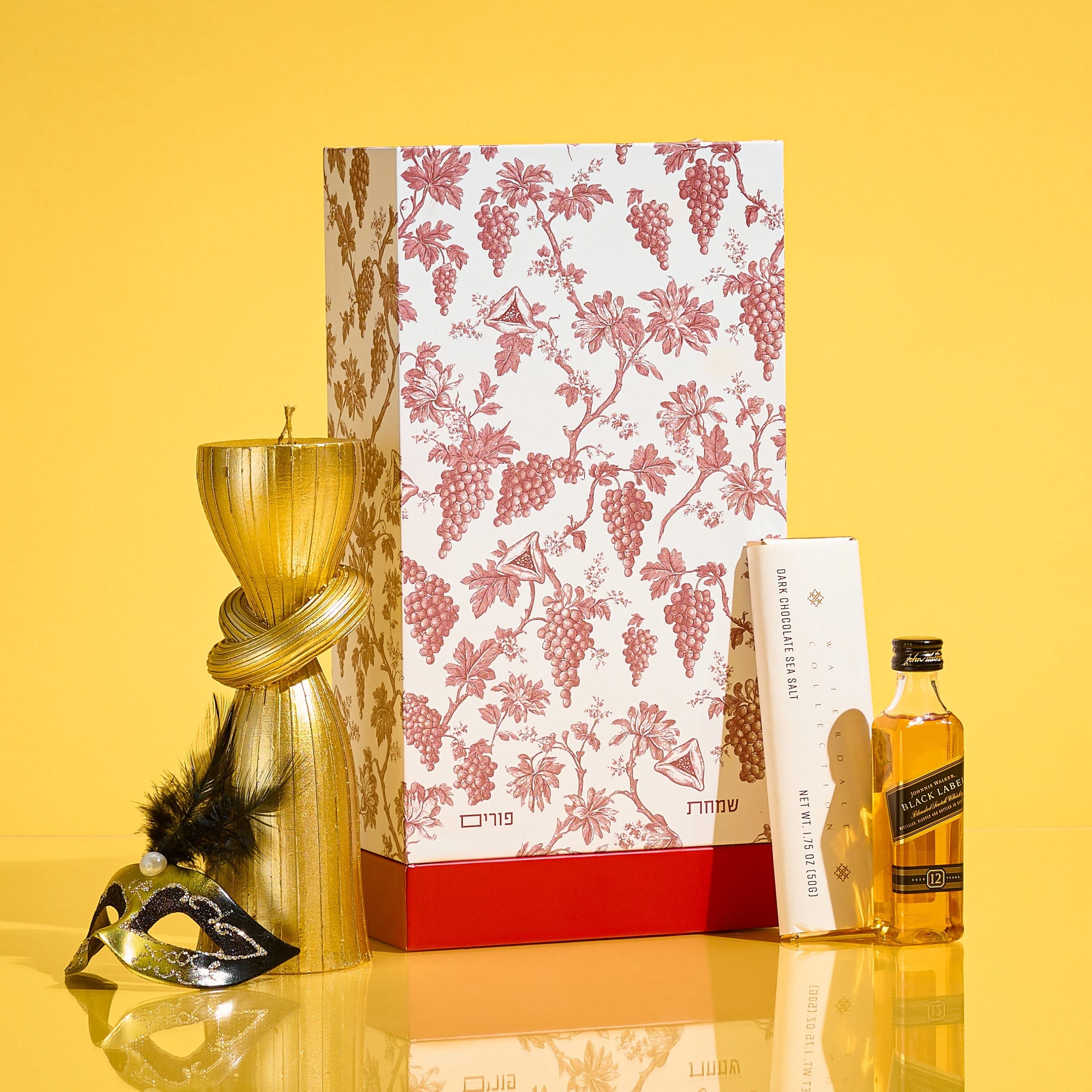 Waterdale Collection Purim Mishloach Manos drawer box with Spiral Havdalah candle, chocolate, and Black Label whiskey