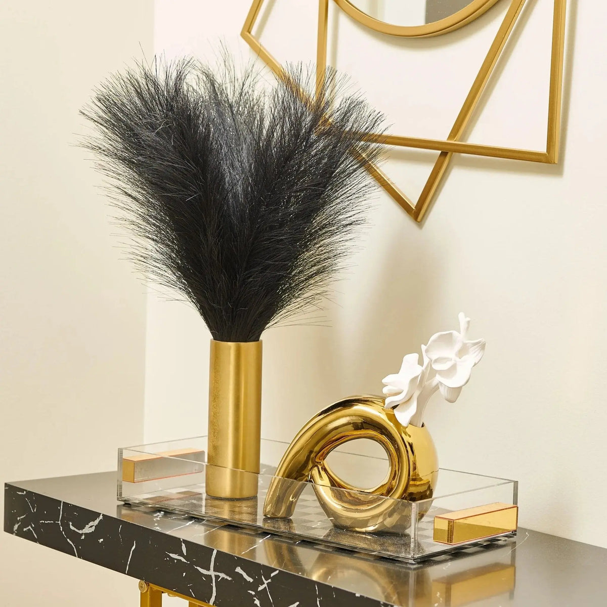 Gold mod floral diffuser with black feather accent and marble base by Waterdale Collection, perfect for home fragrance gifting.