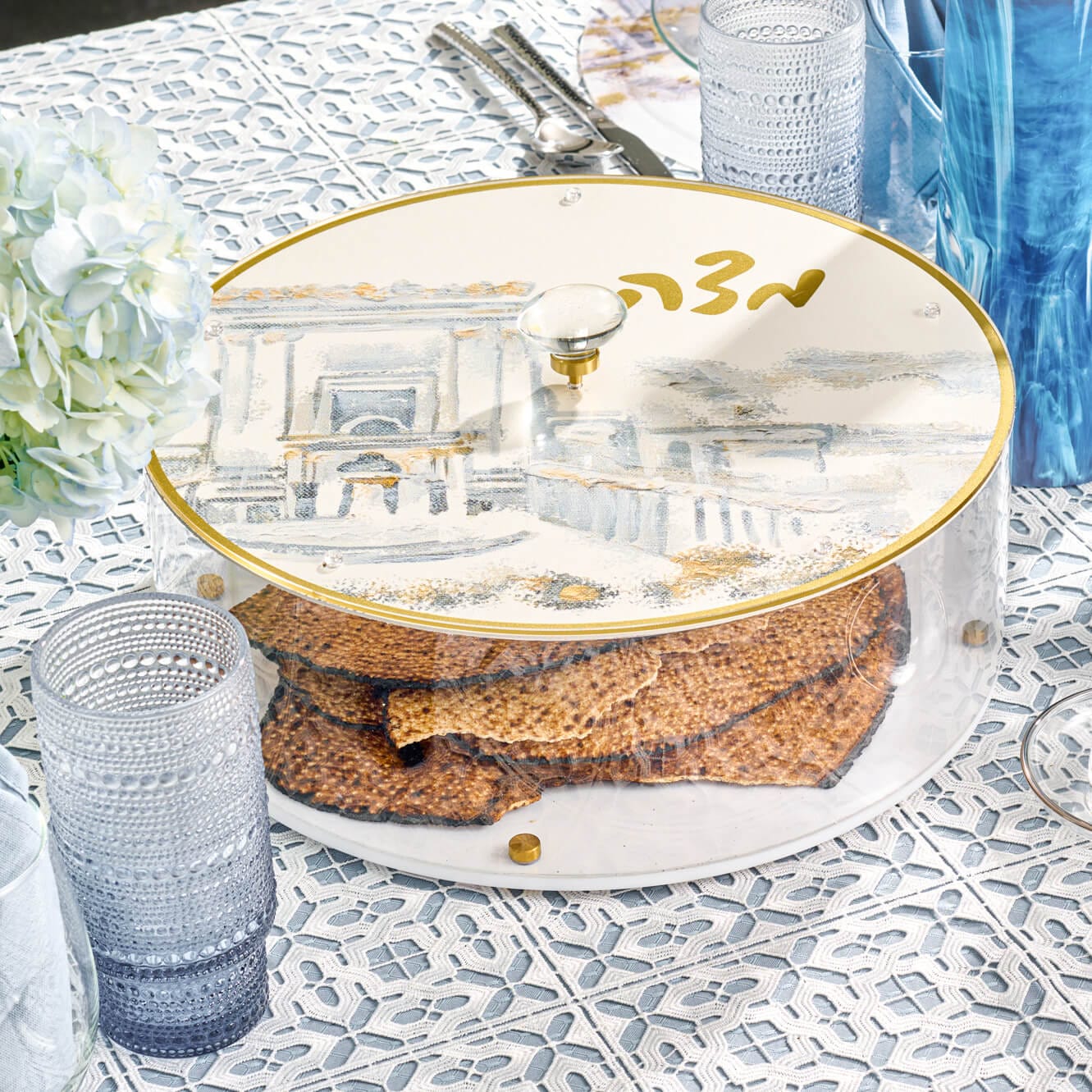 Painted Bais Hamikdash Matzah Box with gold rim and Hebrew 'Matzah' lettering, elegant artistic Judaica tableware.