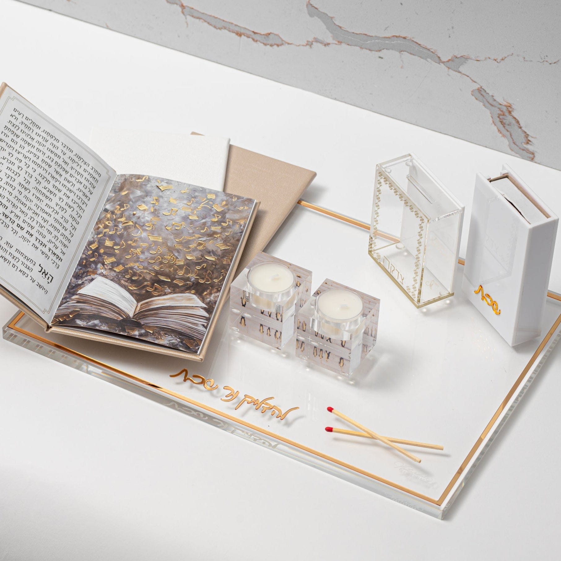 Painted Kosel Tea Light Holders with clear acrylic design displayed on an elegant Shabbat tray setup.