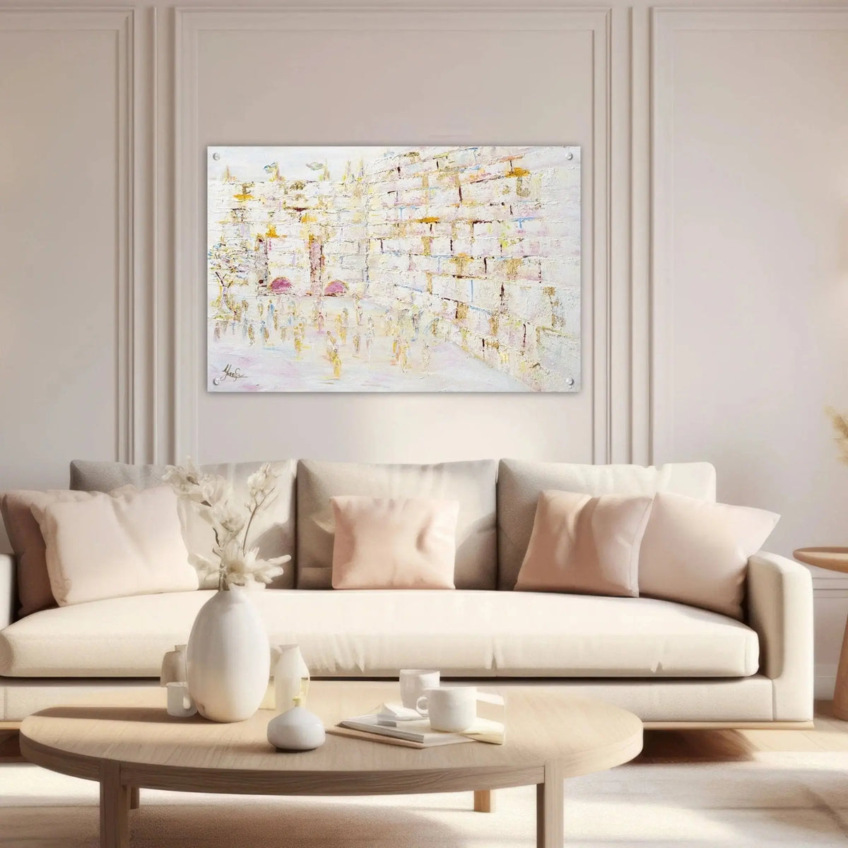 Painted Pastel Kosel by Yosefa hanging above a cream sofa with neutral pillows in a modern living room setting.