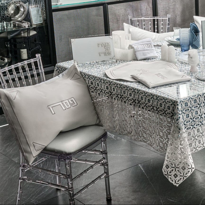 Pearlstone Pesach Set styled on elegant Passover Seder table with silver embroidered matzah cover, afikoman bag, Pesach pillow and matching table décor, modern luxury Judaica holiday collection