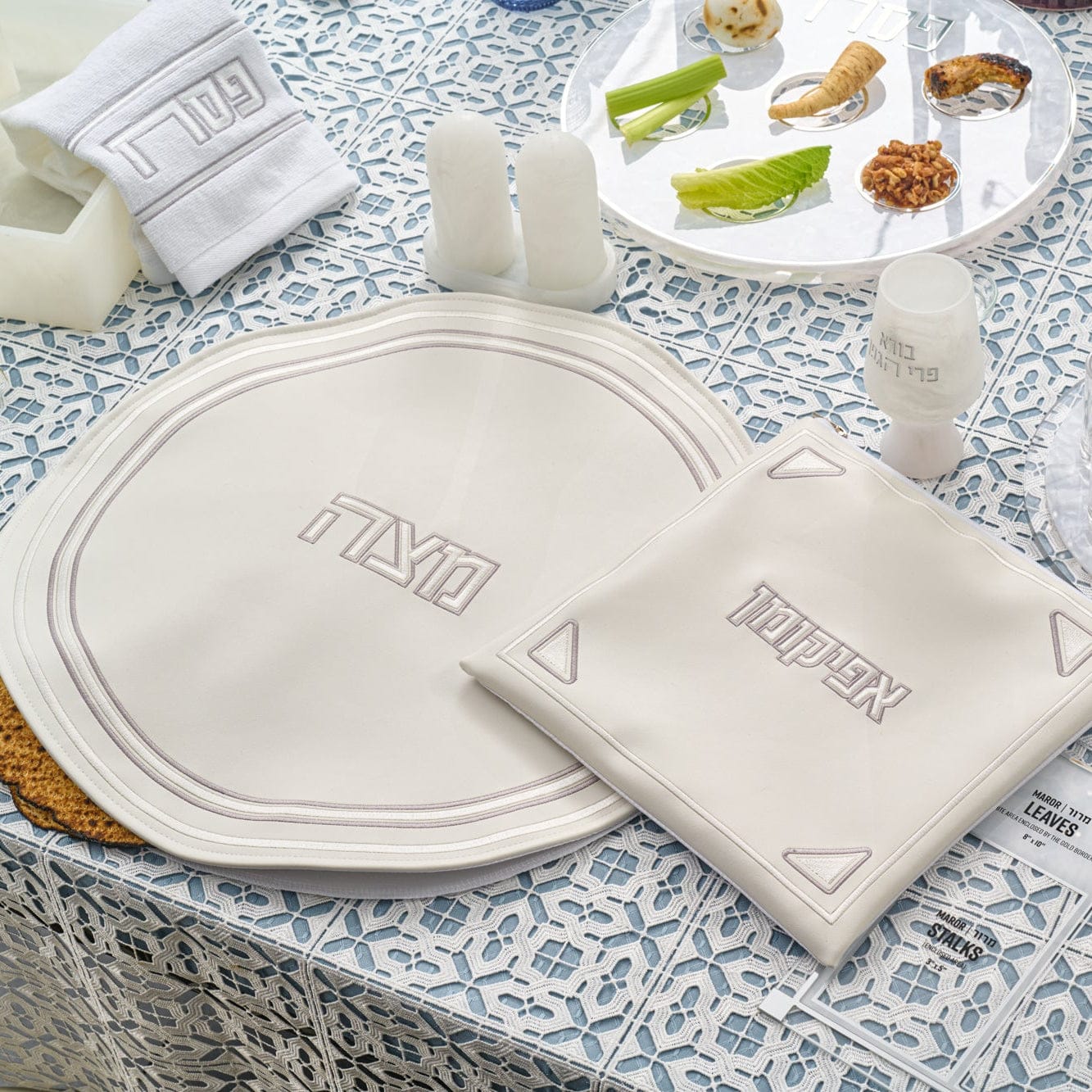 Pearlstone Pesach Set featuring elegant silver embroidered matzah cover and matching afikoman bag, modern cream Passover Seder table décor, luxury Judaica Pesach gift set