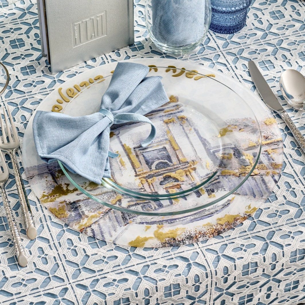 Pesach Bais Hamikdash charger with Jerusalem illustration and gold accents, styled on a Seder table with glass plate and blue napkin.