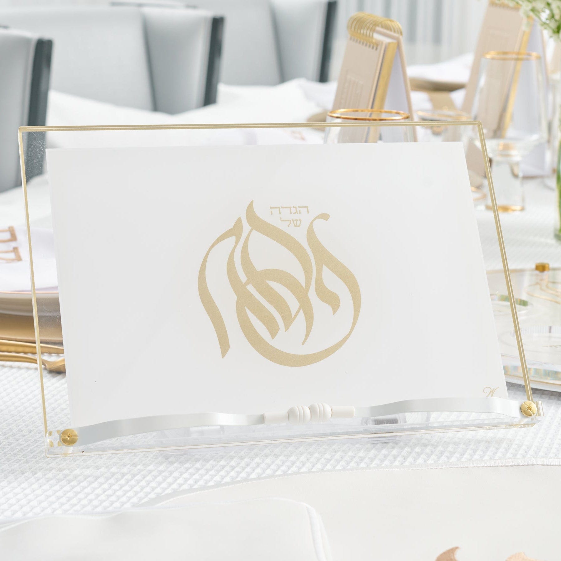 Regal Haggadah Stand on a table.