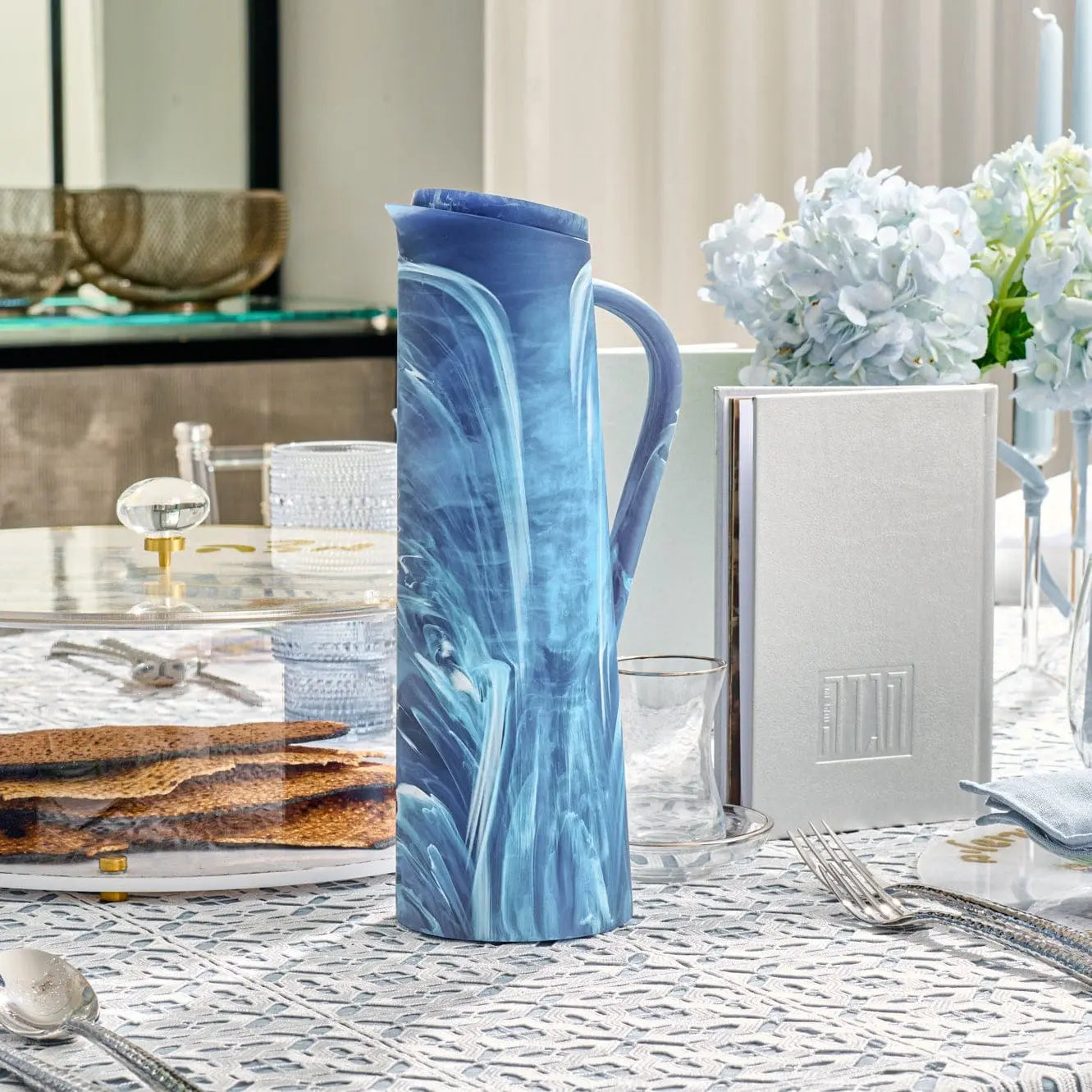 Blue resin pitcher styled on an elegant Shabbat table setting – Waterdale Collection