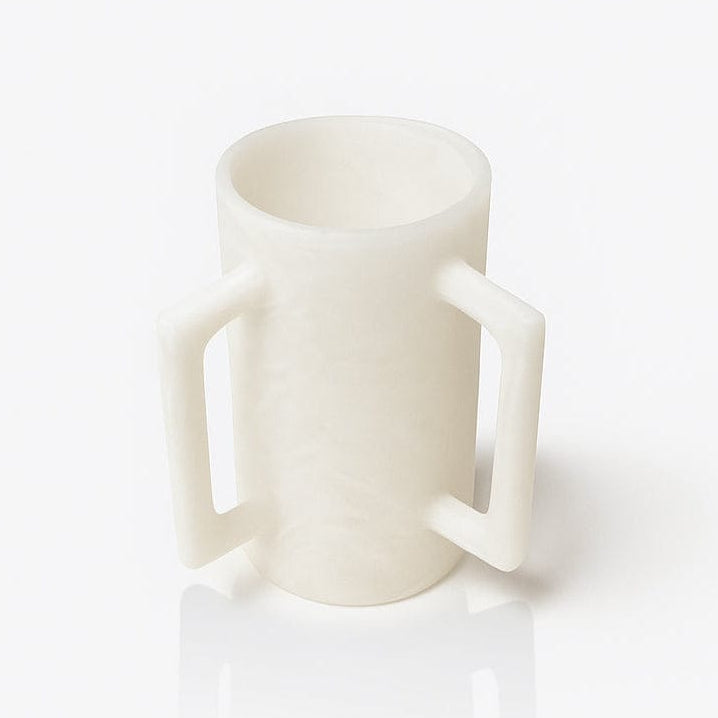 White resin washing cup with handles on a white background