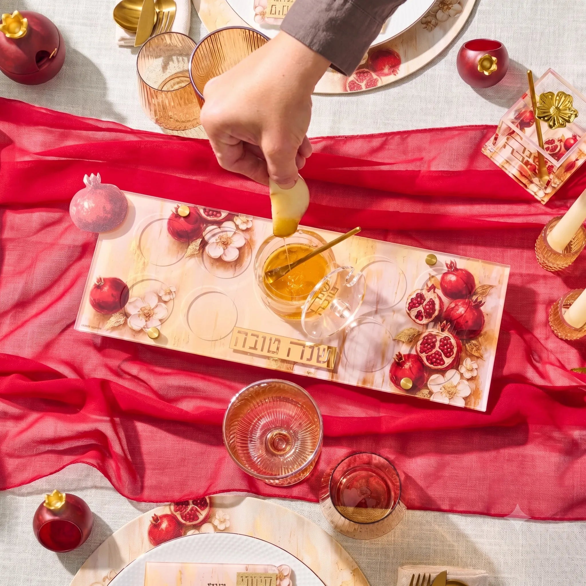 Painted pomegranates Simanim tray styled on a Rosh Hashonah table