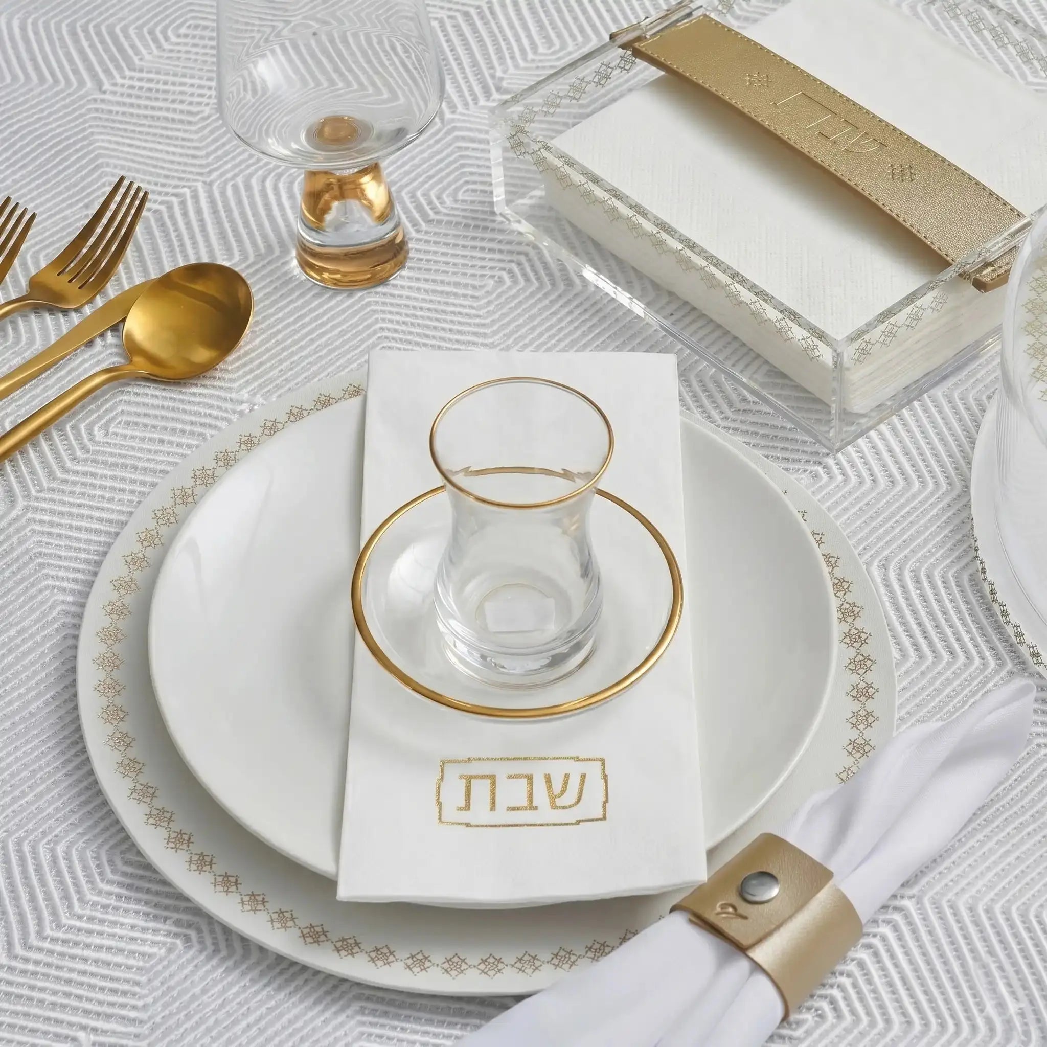 Shabbos napkin set on lifestyle table setting.