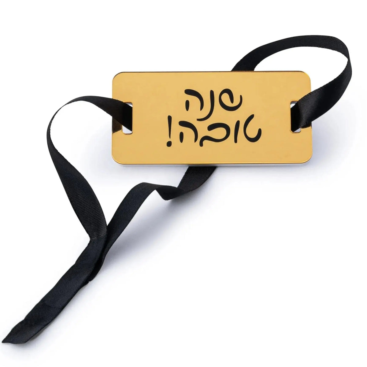 Gold Shana Tova napkin wrap with its black ribbon tie for Rosh Hashonah