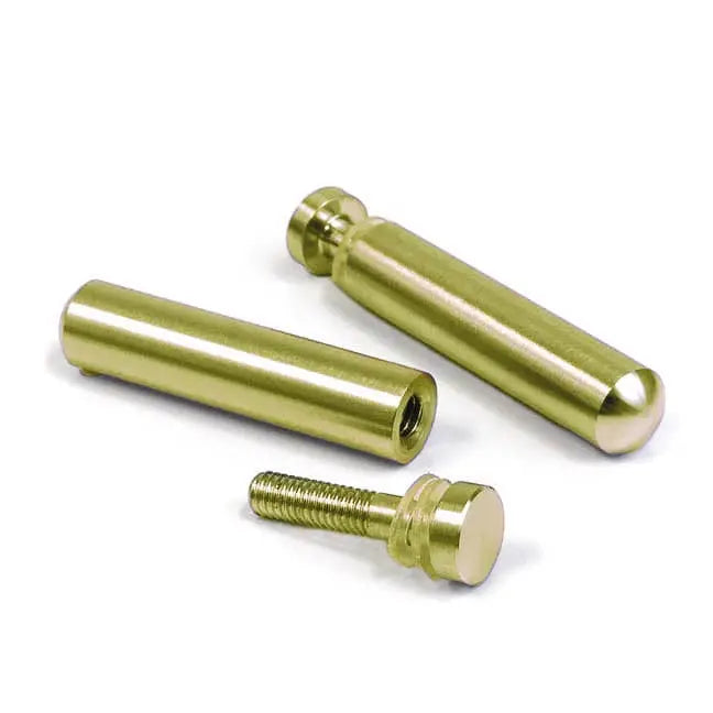 Three gold screws on a white background - Waterdale Collection