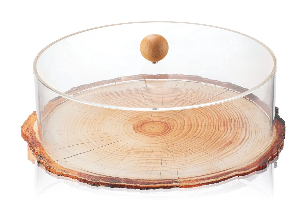Clear glass cake dome with natural wood base and finial, perfect for serving and storing baked goods on any table.