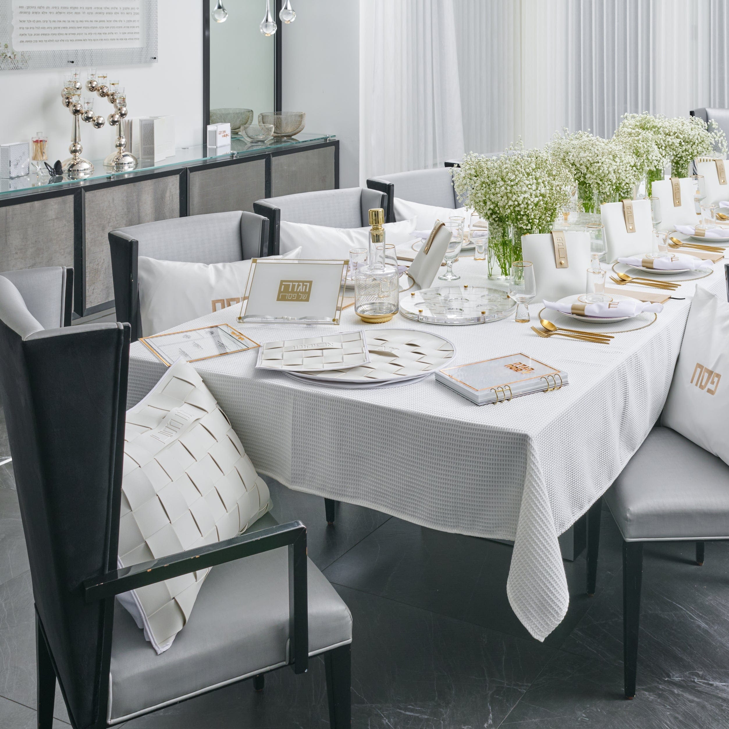 Woven Leather Pesach Set displayed on a beautifully arranged Seder table.