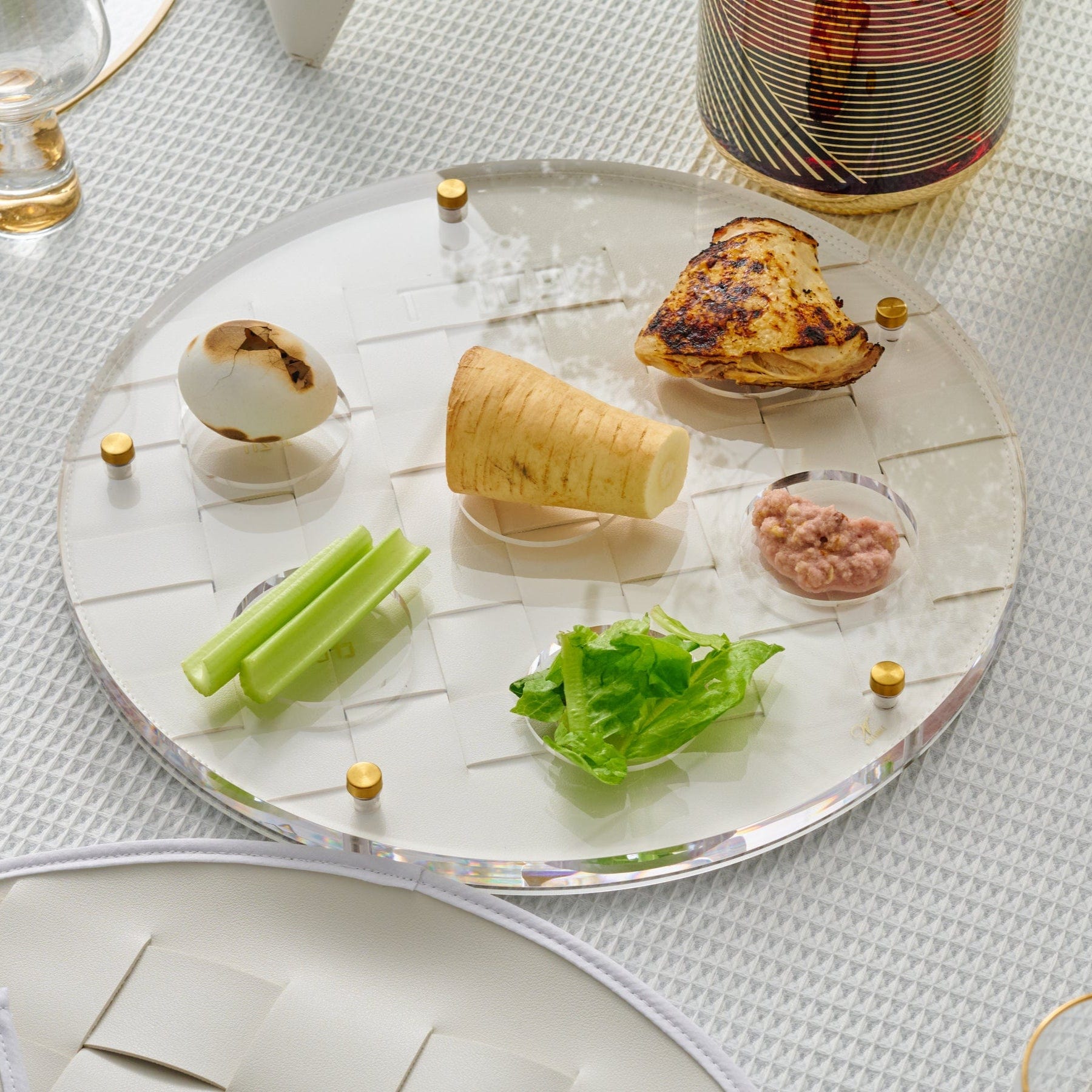 Woven Seder Plate on a refined holiday table.