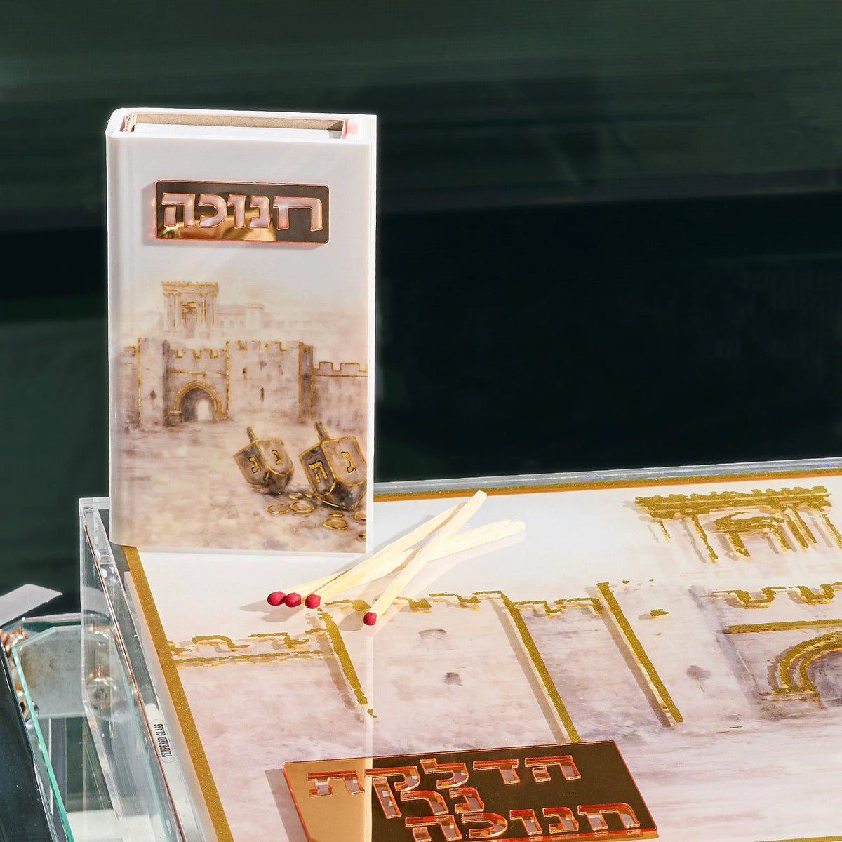 Painted Jerusalem Dreidel Match Box. Luxury acrylic match holder with a watercolor Jerusalem design, perfect for Chanukah décor and gifts.
