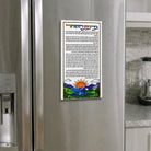 Colored Birchas Hashachar card displayed on a stainless steel refrigerator door, sunrise and mountain landscape filled in with markers