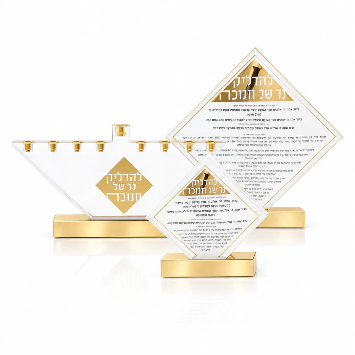 Diamond Chanukah pieces from the Waterdale Collection in gold Lucite, arranged together for the Chanukah table
