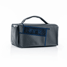 Navy Sukkot etrog case in textured vegan leather with navy fur panel, top handle and zipper.