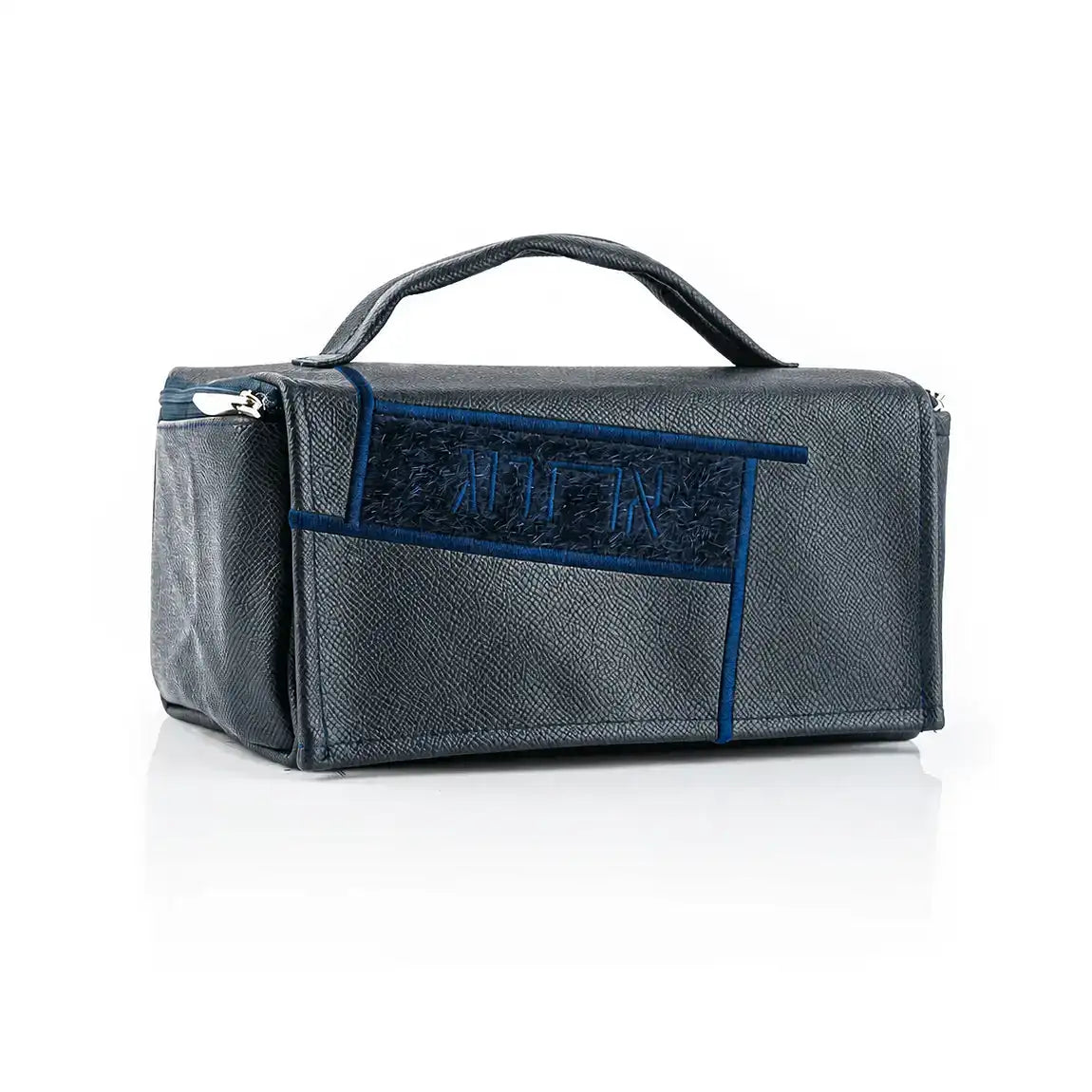 Navy Sukkot etrog case in textured vegan leather with navy fur panel, top handle and zipper.