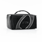 Black fur etrog bag from Waterdale Collection with a grey leather loop and embossed Hebrew lettering.
