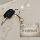 Leather Mizmor Lesoda keychain with מזמור לתודה titled in gold above the full kapitel in Hebrew