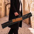 Black Geometric Fur Leather Lulav Case | Man carrying a lulav case  in Jerusalem