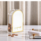 Lucite Tzedakah Box | Clear Arch in Gold on a marble table | Classic Elegant Judaica


