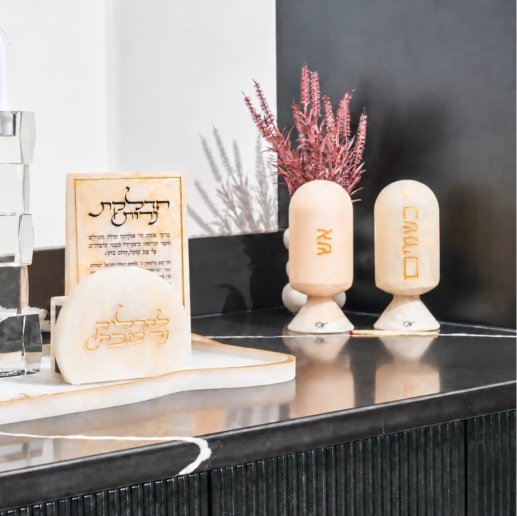 Resin Hadlokas Neiros Set by Waterdale Collection: gold marbled tray, הדלקת נרות block, tzedakah box, matchbox holder, and אש and בשמים cloches for Shabbos