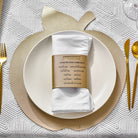 Leather Simanim Napkin Wraps on a white plate and gold apple charger  | Waterdale Collection