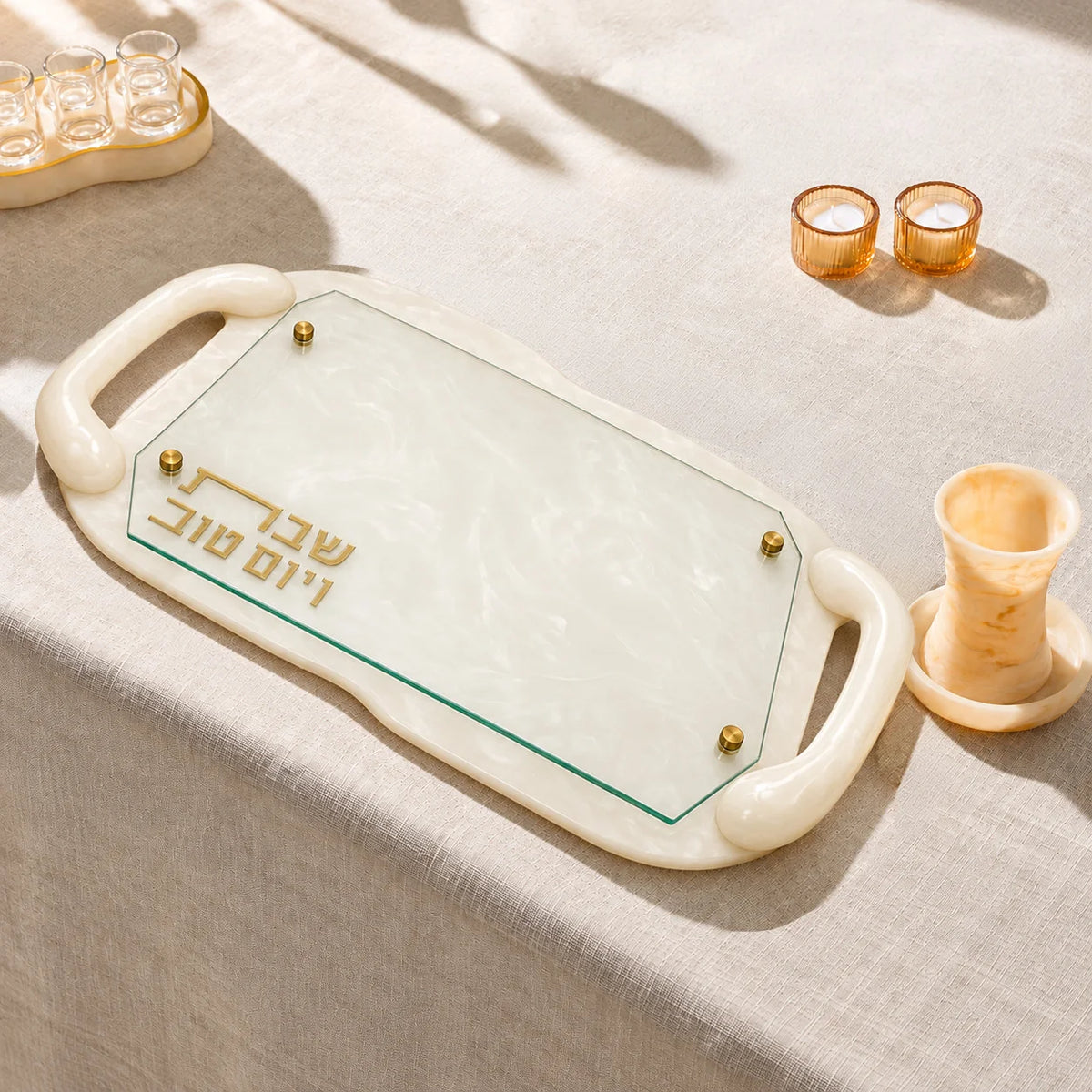 Elevate your Shabbos and Yom Tov table with the Classic Resin Challah Board by Waterdale Collection. 