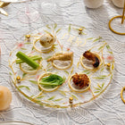 Floral bird seder plate with lucite construction, featuring colorful painted birds and botanical designs around compartments for Passover foods.