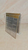 Square, onyx, and colord base bencher set with clear lucite bencher card set inside.