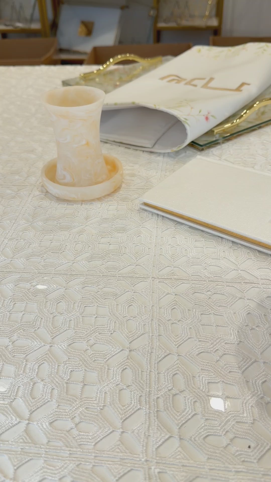 Resin Mayim Acharonim on a shabbos table with water pouring out.
