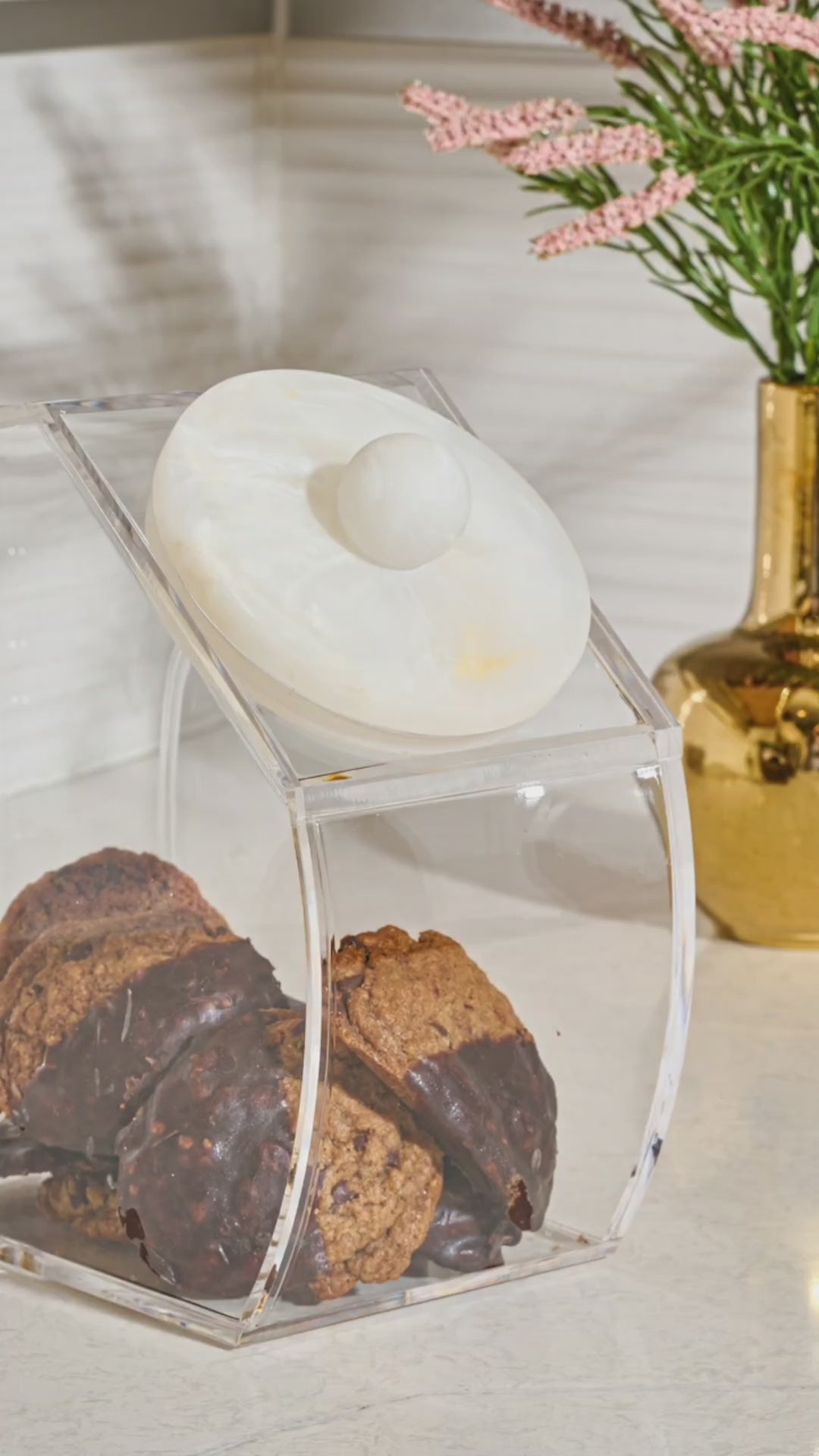 Acrylic and resin cookie jar product video, opening and closing, filling up with cookies.